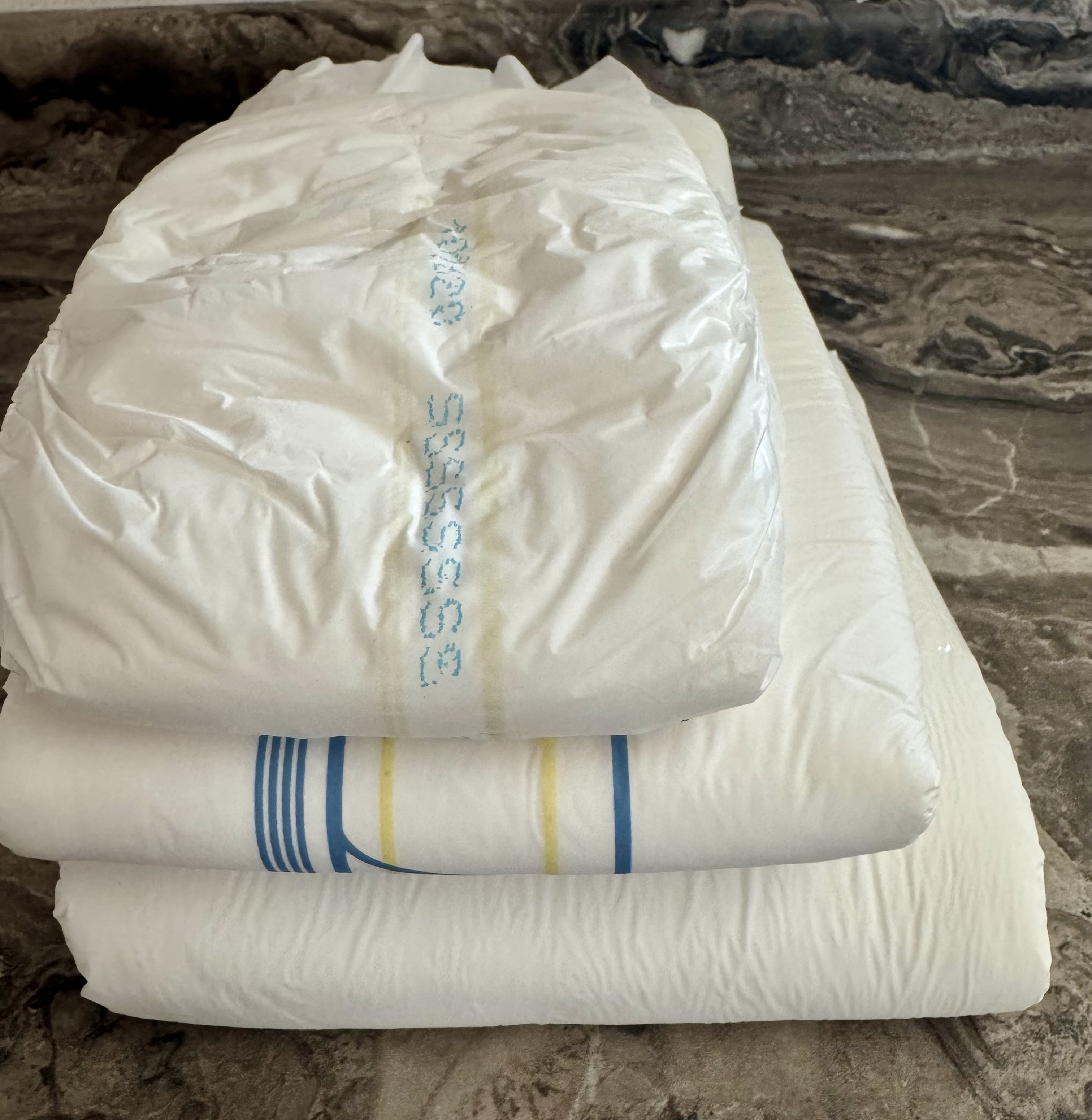 Adult overnight incontinence briefs with high absorbency and leak protection